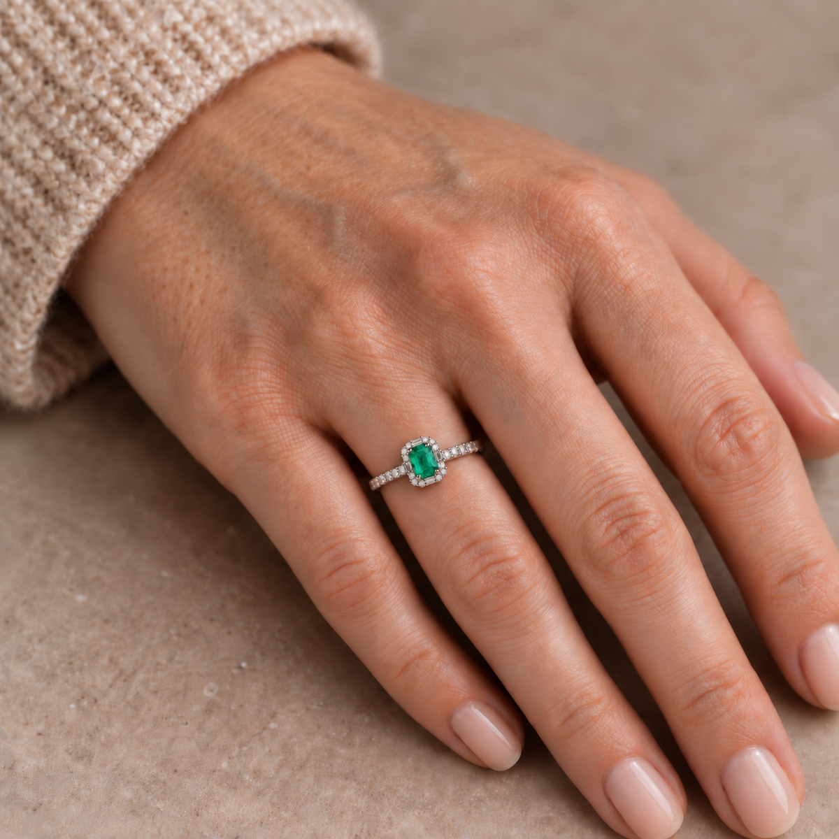 18ct White Gold Emerald and Diamond Halo Dress Ring